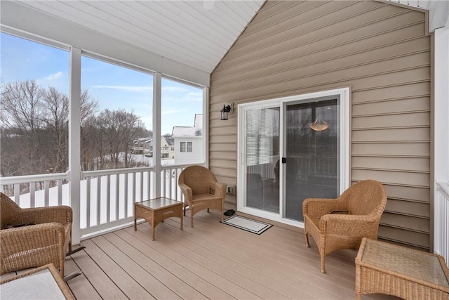 sunroom with lofted ceiling