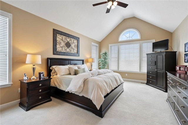 carpeted bedroom with lofted ceiling and ceiling fan