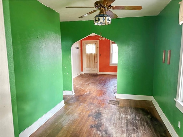 entryway with ceiling fan and hardwood / wood-style flooring