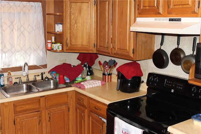 567 Klein Rd, Mill Creek, PA 16145 - kitchen with light countertops, black range with electric cooktop, under cabinet range hood, and a sink