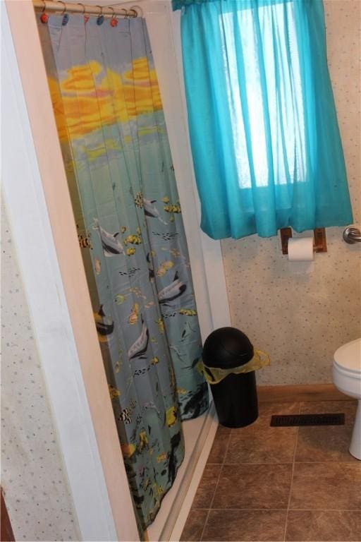 567 Klein Rd, Mill Creek, PA 16145 - full bathroom with a shower with curtain, visible vents, tile patterned flooring, and toilet