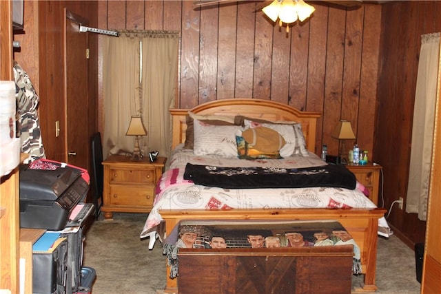 567 Klein Rd, Mill Creek, PA 16145 - bedroom with wooden walls, carpet, and a ceiling fan