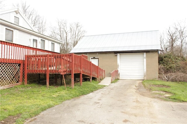 567 Klein Rd, Mill Creek, PA 16145 - exterior space with an outbuilding, aphalt driveway, and a detached garage