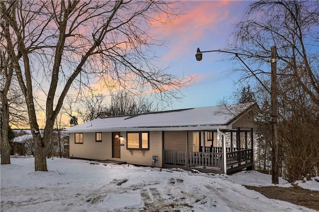 view of snow covered property