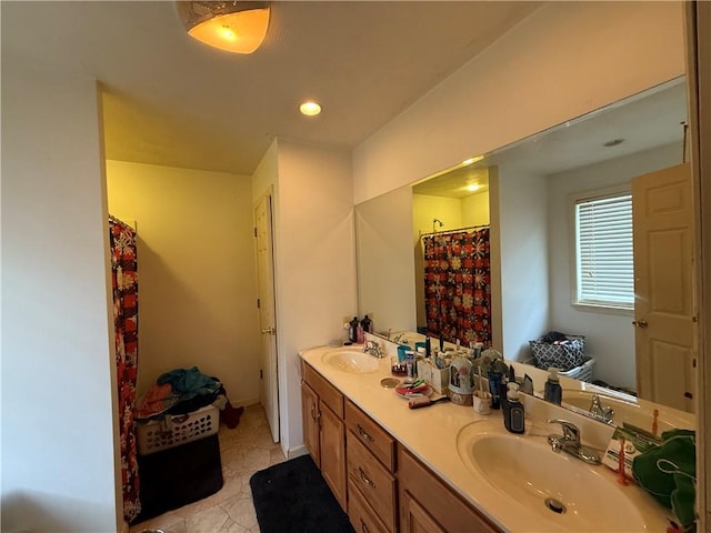 bathroom with vanity and walk in shower