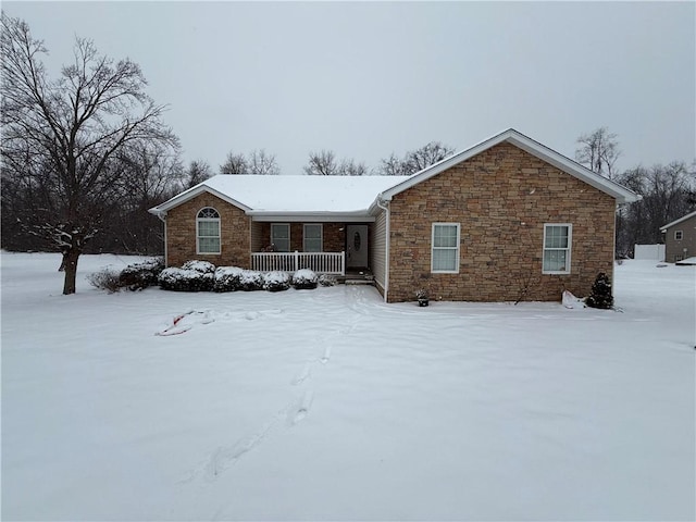 single story home with covered porch