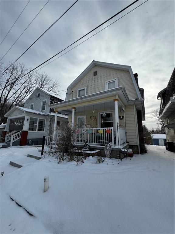 view of front of home featuring covered porch