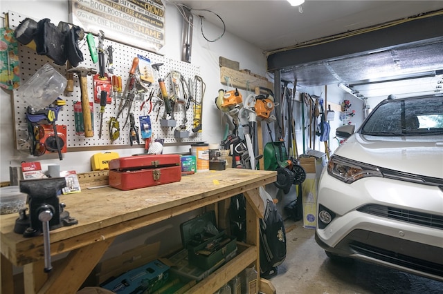 garage featuring a workshop area