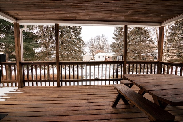 view of snow covered deck