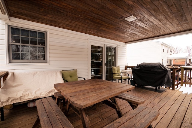 wooden terrace with grilling area