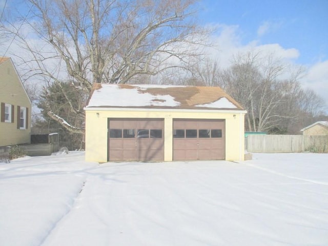 view of snow covered garage