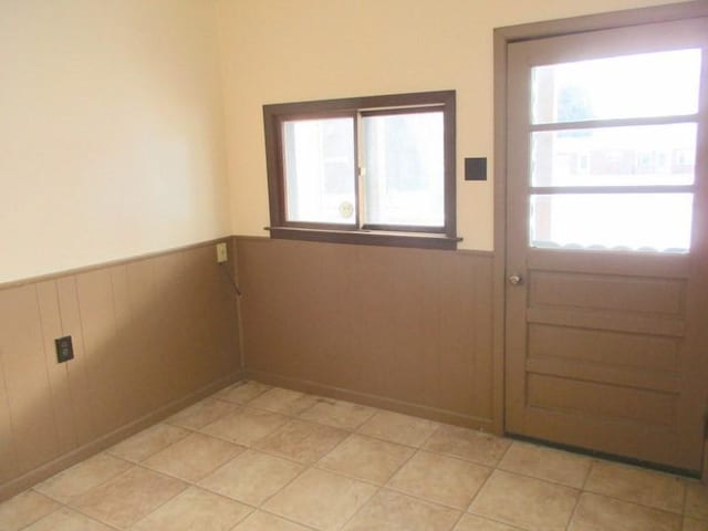 entryway featuring light tile patterned flooring