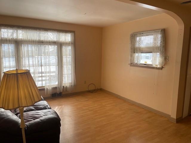 unfurnished room featuring light hardwood / wood-style floors