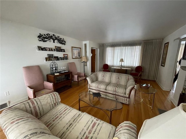 living room with hardwood / wood-style flooring