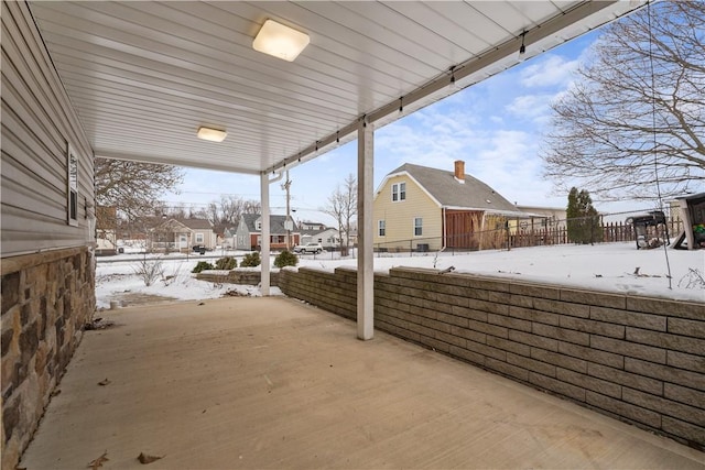 view of snow covered patio