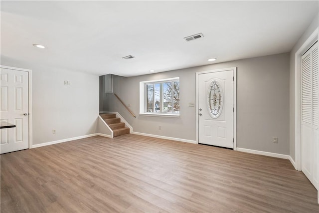 entrance foyer with light wood-type flooring