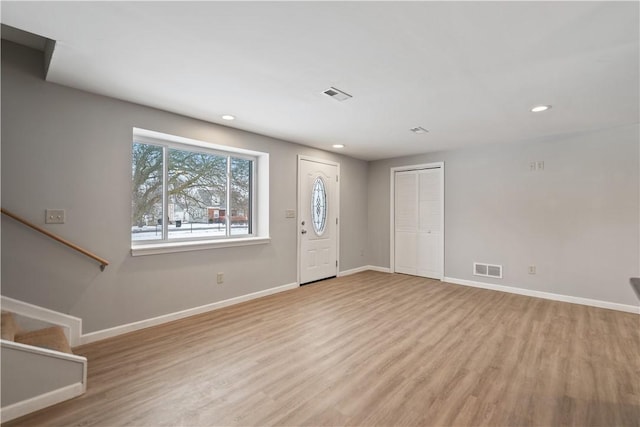 entrance foyer with light wood-type flooring