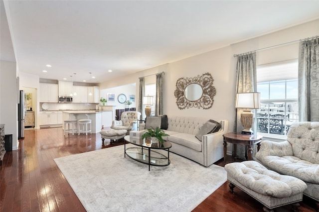 living room with hardwood / wood-style flooring