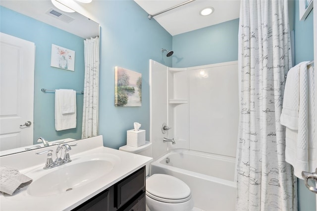 full bathroom with toilet, vanity, and shower / bathtub combination with curtain