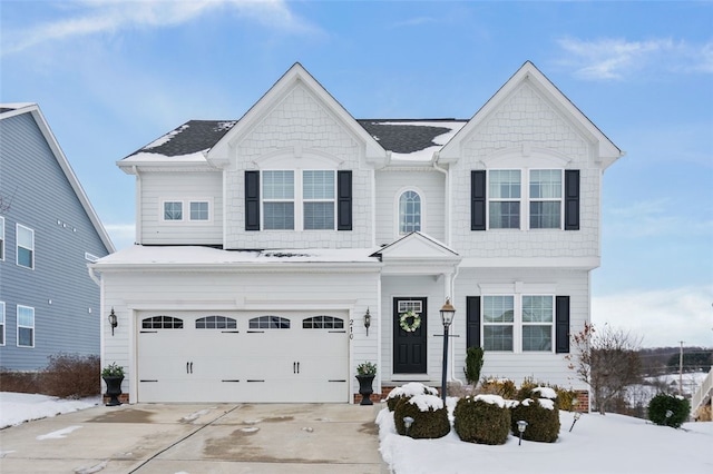 view of front of house with a garage