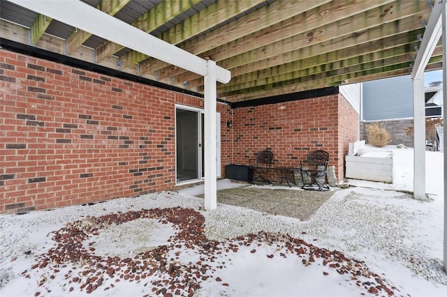 view of snow covered patio