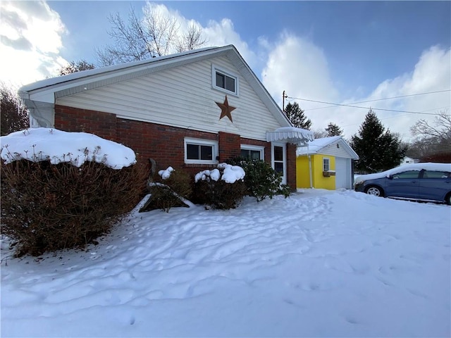 view of snow covered property