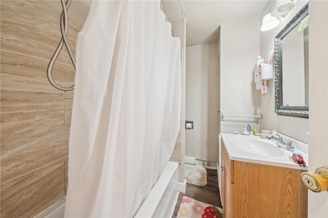 841 Brackenridge Ave, Brackenridge, PA 15014 - bathroom with shower / bath combination with curtain, vanity, and hardwood / wood-style flooring