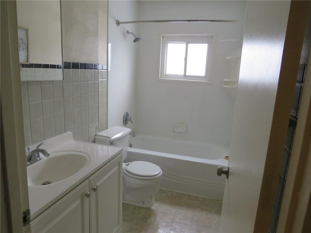 full bathroom featuring shower / bathing tub combination, vanity, and toilet