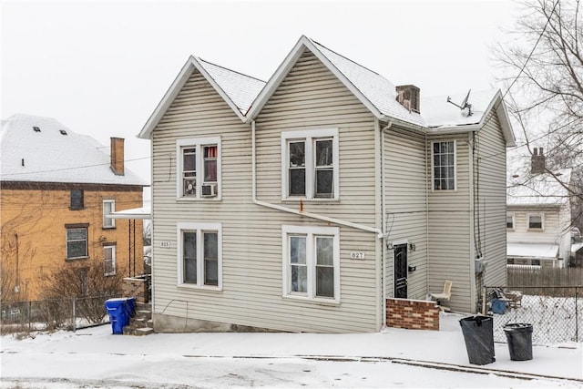 view of snow covered property