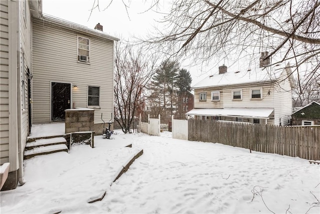 view of yard layered in snow