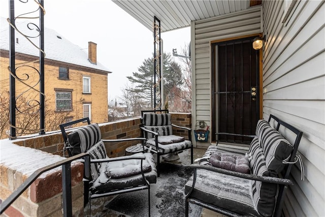 view of snow covered patio