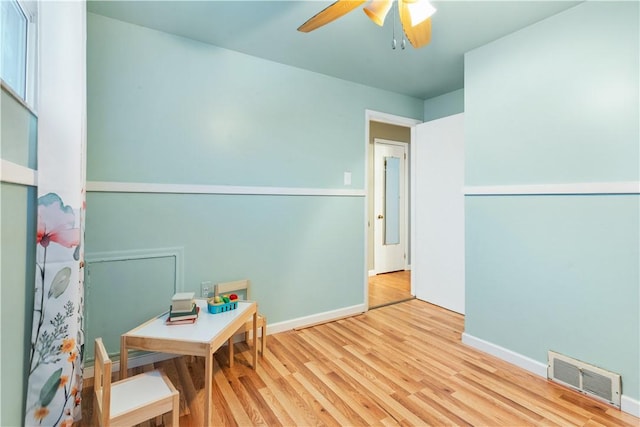 game room featuring ceiling fan and light hardwood / wood-style flooring