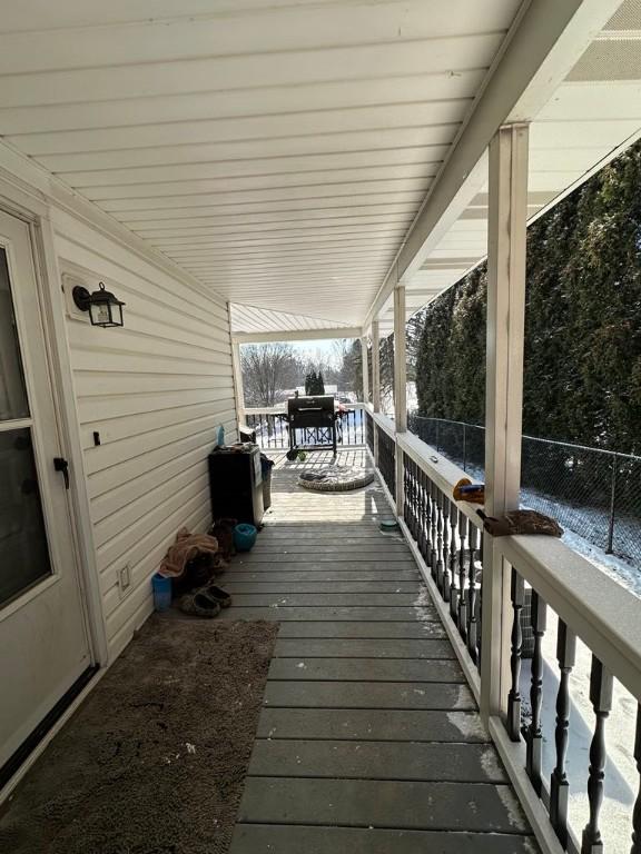 view of snow covered deck