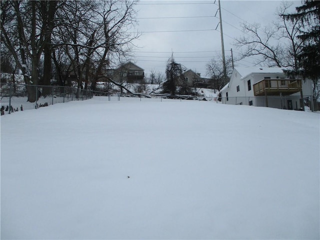 view of yard covered in snow