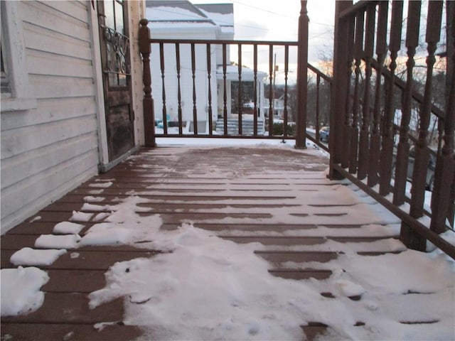 view of snow covered deck