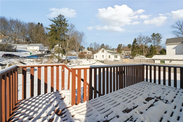 view of snow covered deck