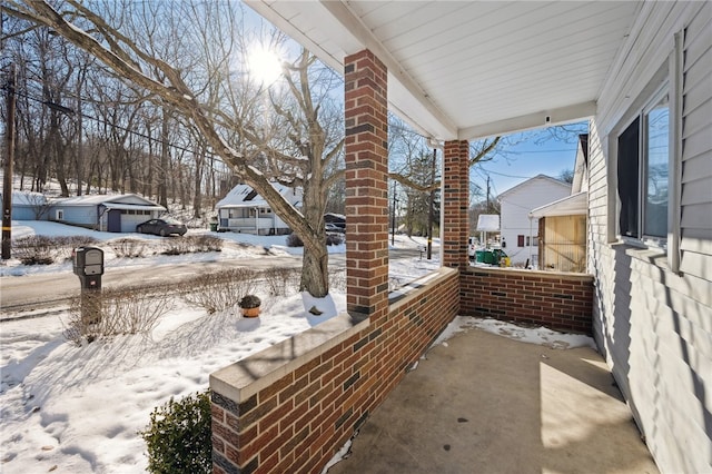 view of snow covered patio