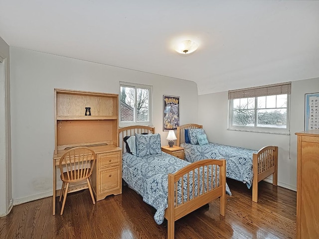 bedroom featuring dark hardwood / wood-style flooring