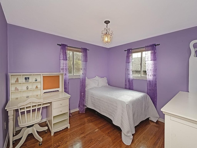 bedroom featuring dark hardwood / wood-style floors