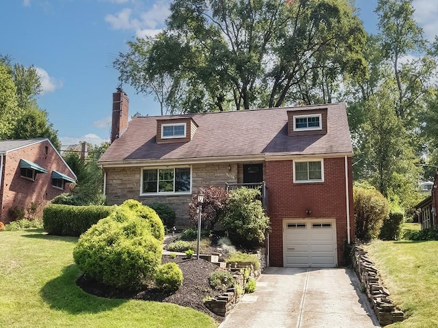 view of front of house featuring a garage and a front lawn