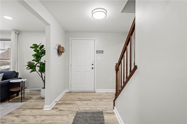 entrance foyer with light wood-type flooring