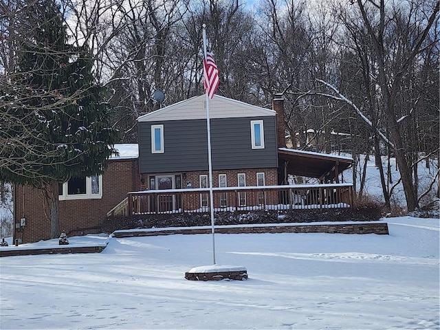 view of snow covered property