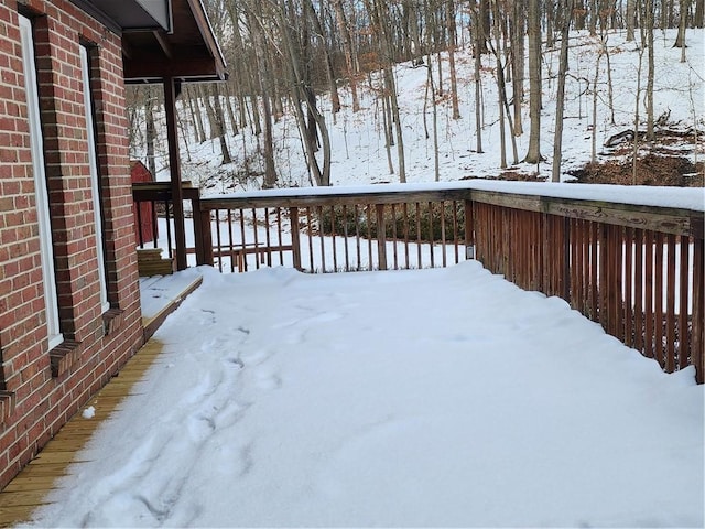 view of snow covered deck