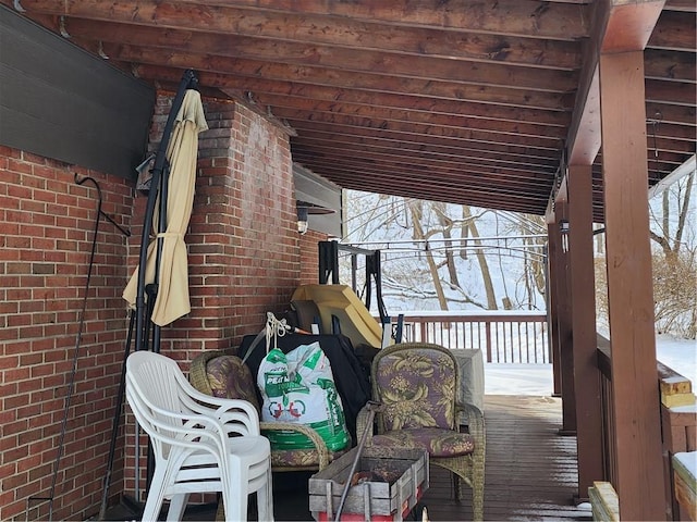 view of snow covered deck