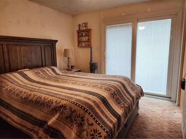 bedroom featuring carpet flooring and multiple windows