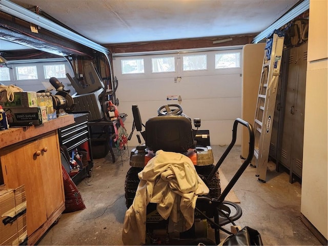 basement with a healthy amount of sunlight and a workshop area