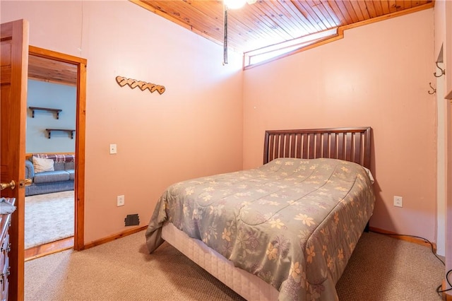 carpeted bedroom featuring wood ceiling