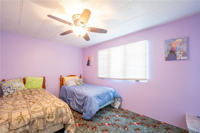 bedroom featuring ceiling fan