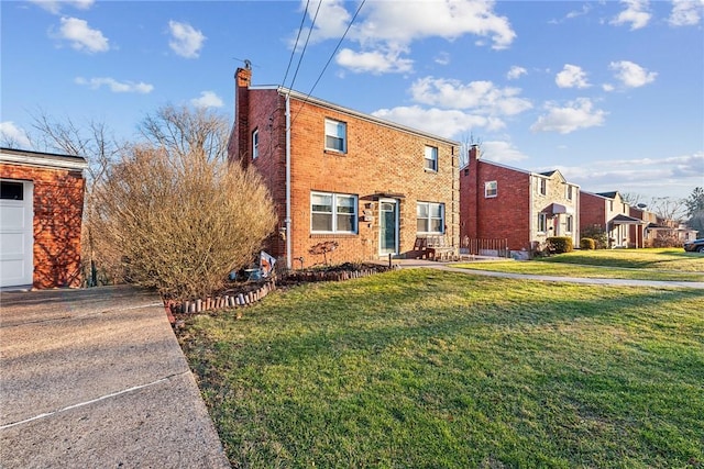 view of front of home with a front yard