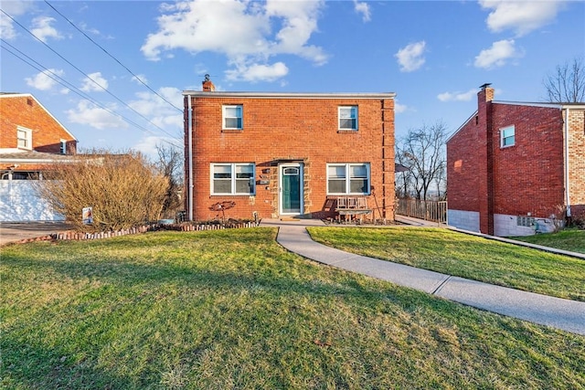 front of property with a front lawn